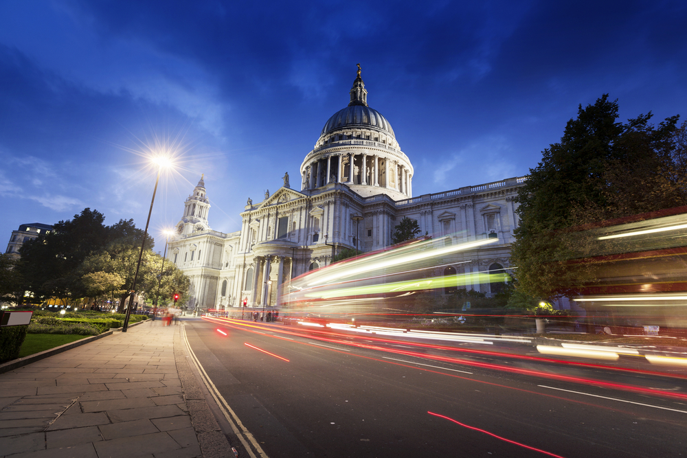 St Pauls Cathedral and moving Double Decker bus, London, UK